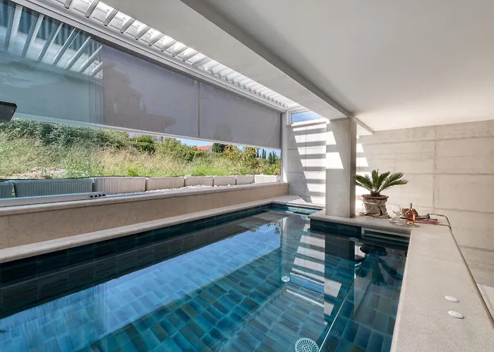 Апартаменты Luxury Private Spa Apartment With Heated Pool & Sauna And Sea View Цавтат